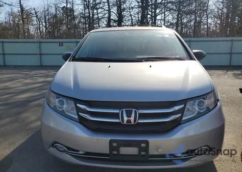2014 Honda Odyssey Touring z USA, uszkodzony, nr VIN 5FNRL5H94EB094357